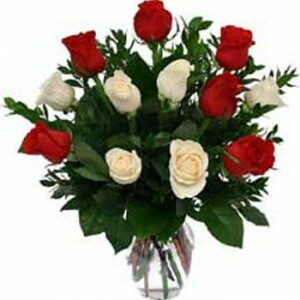 vase of white red roses