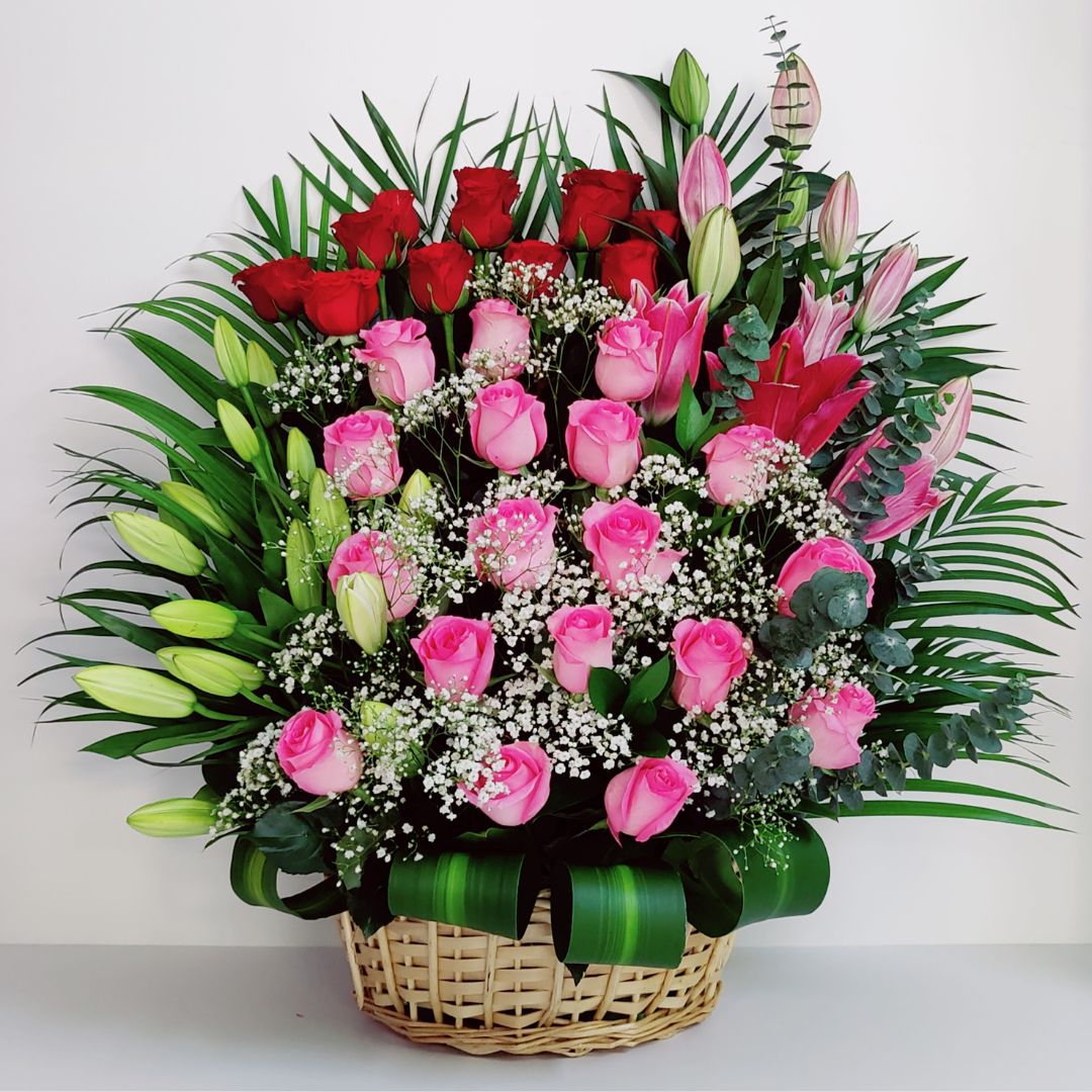 A Big Basket Arrangement of Lilies Roses Red White as Gift