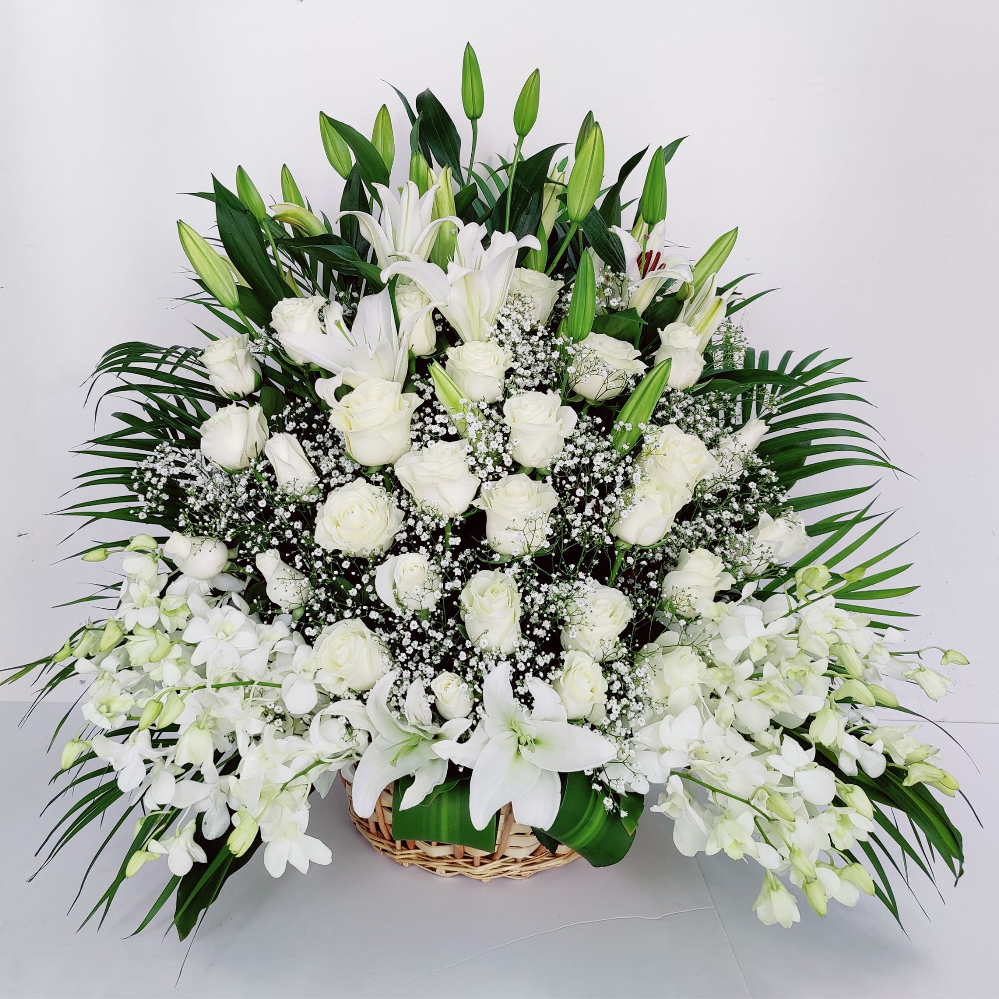orchids lilies roses basket